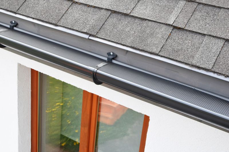 Gutter System with Leaf Guards